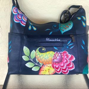 Anushka navy floral hand painted leather bag NWT